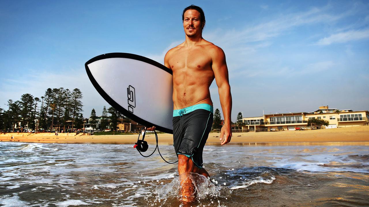 Winter Olympian Alex “Chumpy” Pullin surfing at Dee Why beach before he left Australia to prepare for Sochi Winter Olympics.