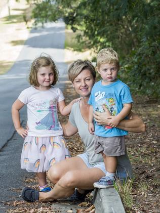 Seventeen Mile Rocks resident Jamie Quinn with her children Elsie and Samuel. Picture: AAP Image/Richard Walker