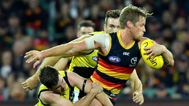 Rory Sloane breaks a tackle. Picture: AAP Image/Sam Wundke