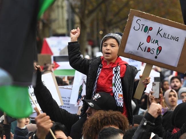 People take part in a protest rally in Melbourne, calling for an end to the escalating violence between Israel and the Palestinian Territories. Picture: AFP