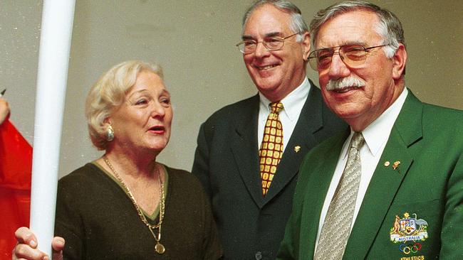 Ron Crawford, right, with Gloria Cooke-Wigney who competed in the 1956 and 1960 Olympics in the hurdles, and swimmer Jon Devitt, at a dinner for the Sydney Olympics in Gosford in 2000. Picture: Bill Rosier