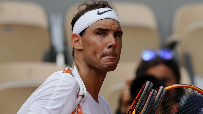 Spain's Rafael Nadal looks on as he leaves the court after taking part in a practice session ahead of The French Open tennis tournament on Court Philippe-Chatrier at The Roland Garros Complex in Paris on May 21, 2024. (Photo by Dimitar DILKOFF / AFP)