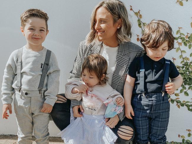 A co-ordinated, tonal family wardrobe! Blogger Jo Zammit and her three children, wearing next.com.au. Picture: Next