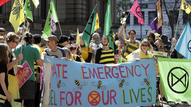 Protestors at Town Hall in Sydney on Tuesday. Picture: Rick Rycroft/AP