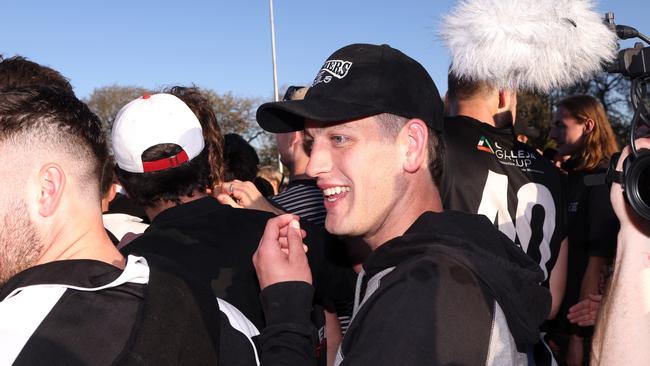 AFL player Zak Butters celebrates a premiership win with Darley. Picture: Hamish Blair