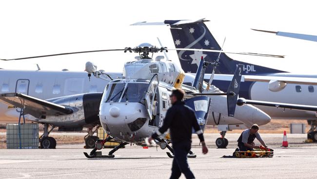 The identity of three US marines tragically killed when an Osprey aircraft crashed on the Tiwi Islands on Sunday has been revealed. (Photo by DAVID GRAY / AFP)