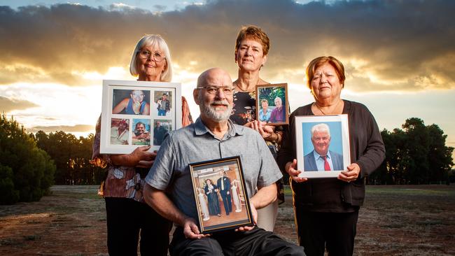 Sandi Todd holding a frame of photographs of her husband, Stephen Lavender with his wife Linda’s, Veronica Leaney,holding her husband Roger’s and Elisabetta Ferraro with Frank’s. Picture: Matt Turner.