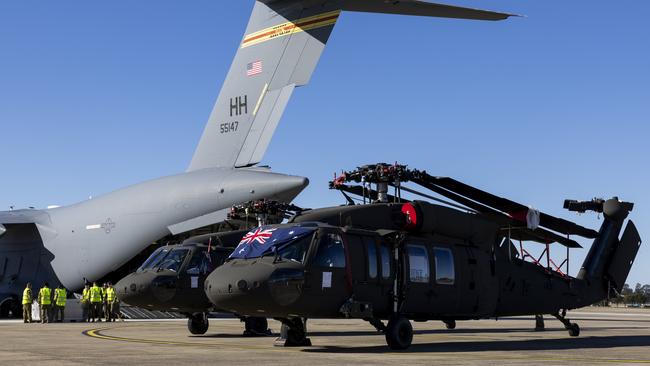 Two Australian Army UH-60M Black Hawk helicopters are unloaded from a US Air Force C17 Globemaster III, at RAAF Base Richmond, Sydney. Picture: Department of Defence