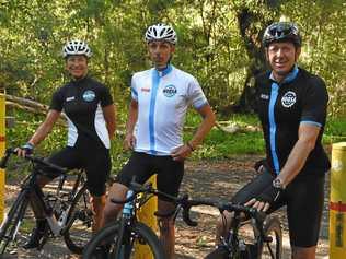 SADDLING UP: Noosa bike enthusiasts filming an uphill ride through Tinbeerwah Forest. Picture: Peter Gardiner