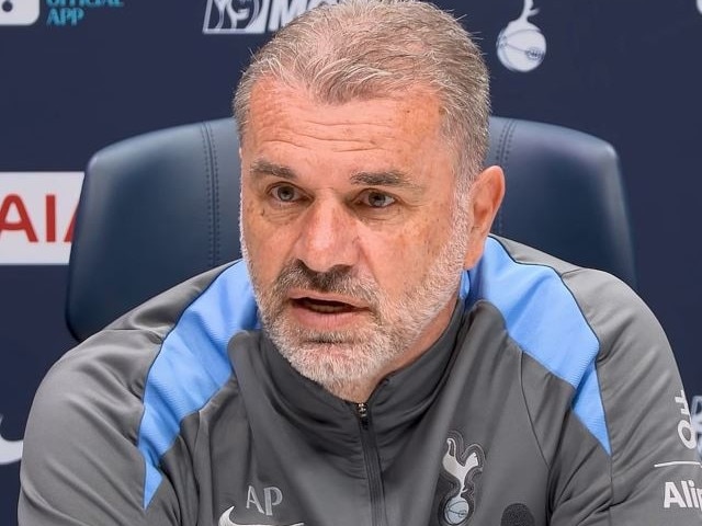 Ange Postecoglou speaks to reporters.
