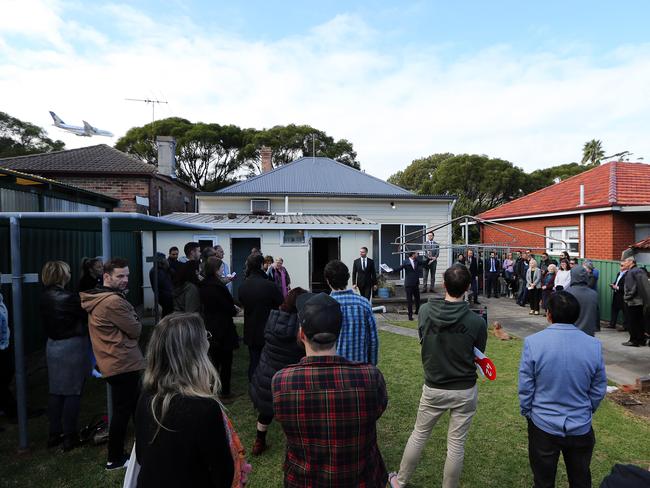 SUNDAY TELEGRAPH - Pictured is an auction at 21 Holmesdale Street, Marrickville today. Picture: Tim Hunter.