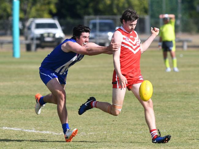 Yeppoon Swans' Michael Gallagher (right).