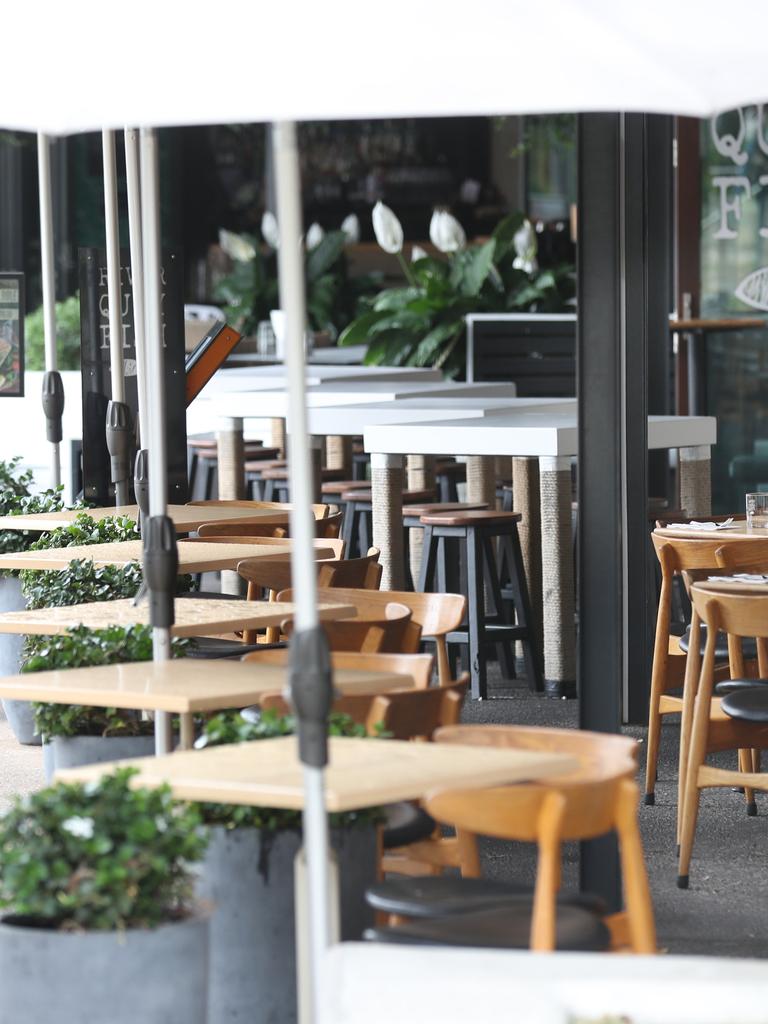 Empty tables at South Bank yesterday. Picture: Annette Dew