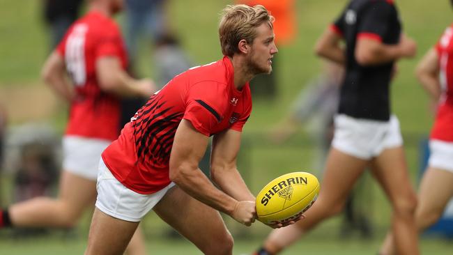 Darcy Parish warms up for the Marsh Community Series clash with the Eagles. Picture: Paul Kane/Getty Images