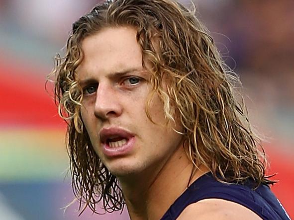 PERTH, AUSTRALIA - APRIL 24: Nathan Fyfe of the Dockers walks from the three quarter time huddle with his lower left leg iced during the round five AFL match between the Fremantle Dockers and the Carlton Blues at Domain Stadium on April 24, 2016 in Perth, Australia. (Photo by Paul Kane/Getty Images)