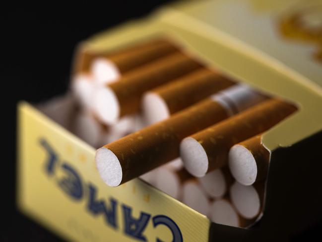 (FILES) This file photo taken on September 25, 2014 shows a packet of Camel cigaretes taken in Paris. British American Tobacco agreed on January 17, 2017, to pay almost $50 billion for control of US peer Reynolds American in a move which targets the lucrative United States market and the fast-growing e-cigarette sector. The deal brings together a raft of global brands, including BAT products Lucky Strike, Rothmans and Kent, and Reynolds' brands such as Newport, Camel and Pall Mall. / AFP PHOTO / JOEL SAGET