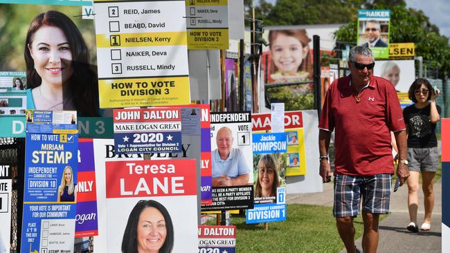 Voters in the Logan City Council election are seen at a pre-polling booth in the suburb of Slacks Creek in Logan City, Thursday, March 26, 2020 (AAP Image/Darren England)