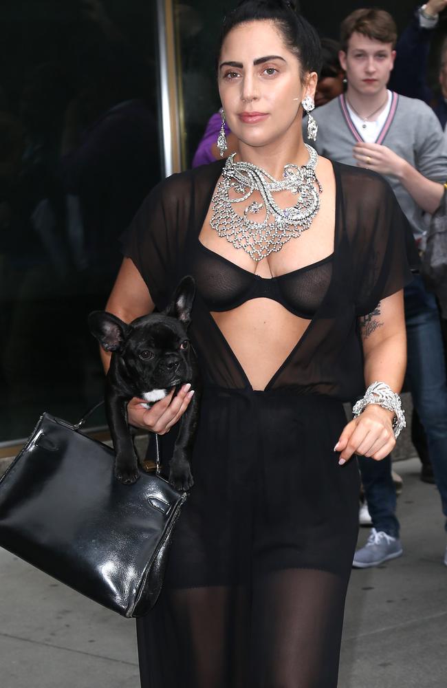 Lady Gaga leaving her hotel in New York. Thank heavens she remembered her bra.