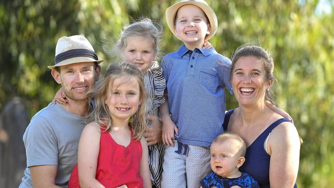 Ned Isham, 5, and his dad Seth, mum Emily, sisters, Lucy, 9, and Eleanor, 2, and baby brother Gilbert enjoying Ned’s first days out of isolation following a bone-marrow transplant. Picture: JASON EDWARDS