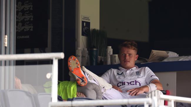 Ollie Pope waits out a rain delay during day three of the first Ashes Test. Picture: Getty