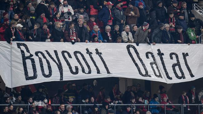 Fans hold a banner reading "Boycott Qatar" ahead of the German Bundesliga football match between SC Freiburg and Union Berlin in Freiburg. Picture: AFP