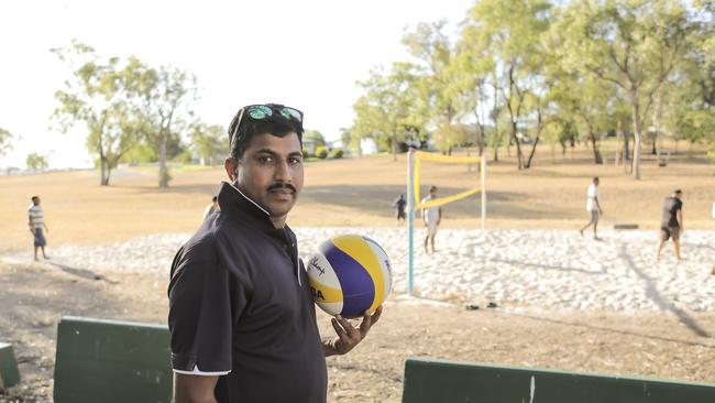 Sid Sathees and friends playing volleyball. Picture: Mark Cranitch.