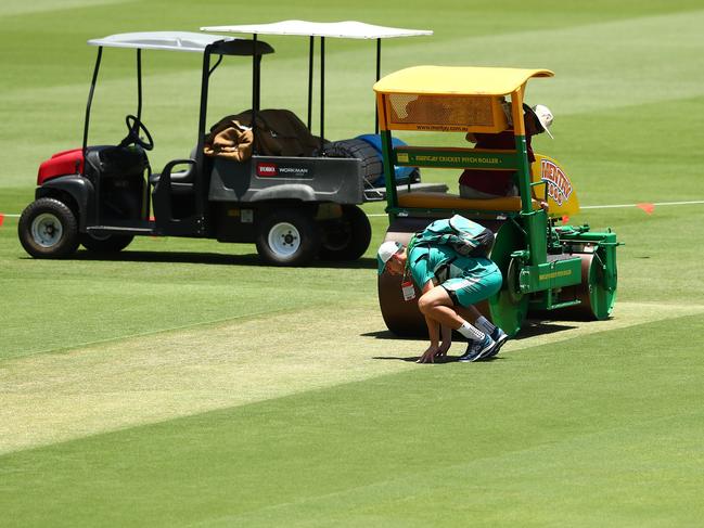 Pat Cummins inspects the Gabba pitch ahead of the first Ashes Test. Picture: Chris Hyde/Getty Images