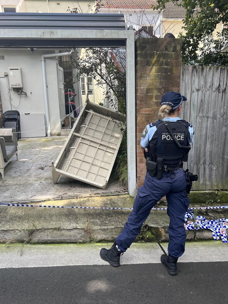 The Paddington terrace being searched by police.