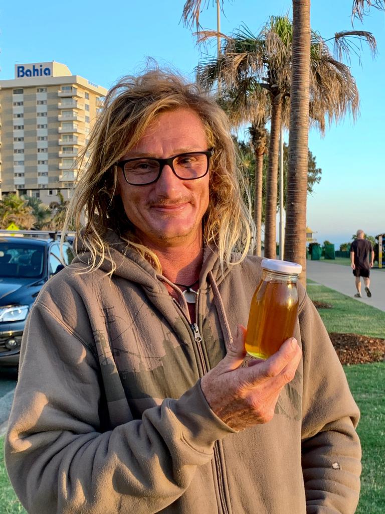 Local Jai Love with his BeeLove honey at Surfers Paradise. Picture Jenny Masters