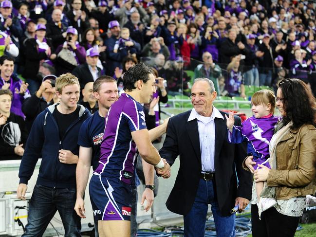 Ronnie with Billy during his lap of honour after the 2012 NRL grans final. Picture: Supplied