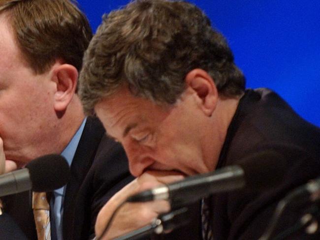 Aust politician Prime Minister John Howard (l) with Peter Costello (c) and Senator Robert Hill at the Liberal Party National Convention in Adelaide 06 Jun 2003.