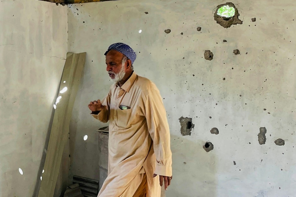 Pakistan’s Kashmiris return to homes, but keep bunkers stocked