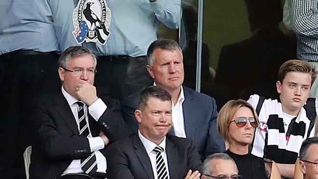 Graeme Allan watches a Magpies game this year with Eddie McGuire and Gary Pert. Picture: Michael Klein