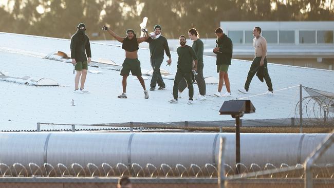 Prison inmates are seen rioting on the roof of Parklea Correctional Centre. (Photo by Matt Blyth/Getty Images)