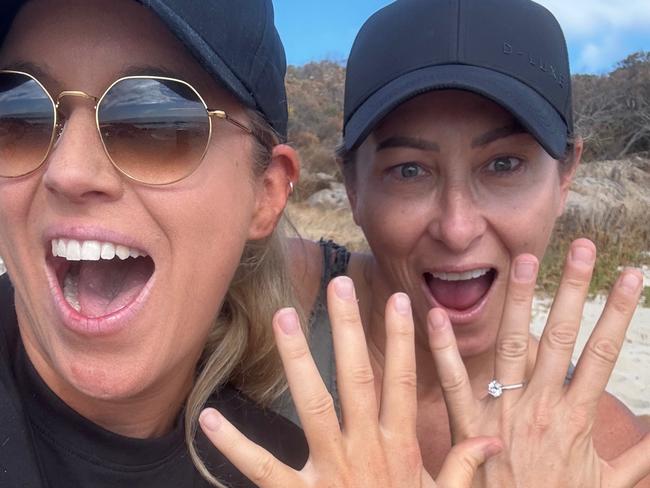 Perth Triple M radio host Katie Lamb (left) and AFL West Coast Eagles backline coach Martene Pearman are engaged. Picture: Supplied