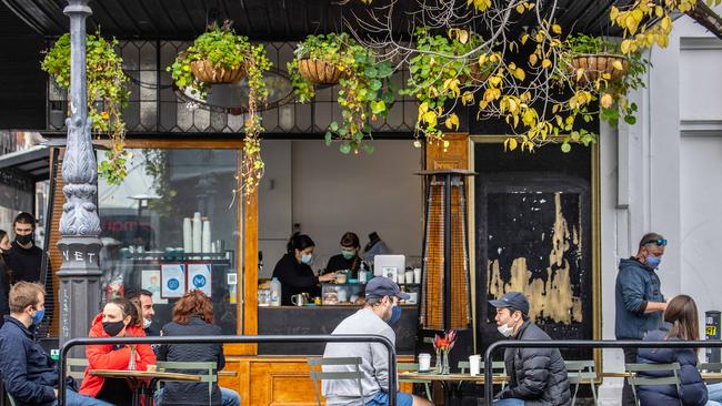 People enjoy dining at a cafe in Brunswick Street after lockdown. Picture: NCA NewsWire / Sarah Matray