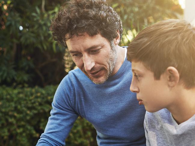 Shot of a father and son having a heart to heart in the backyardhttp://195.154.178.81/DATA/i_collage/pi/shoots/783938.jpg