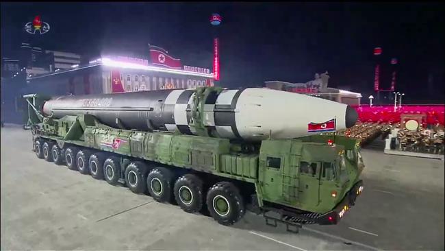 The new ICBM was carried on an enormous and previously unseen 11-axle transporter-erector-launcher, far larger than the eight-axle Chinese-made vehicles the North has employed so far. Picture: KCNA via AFP