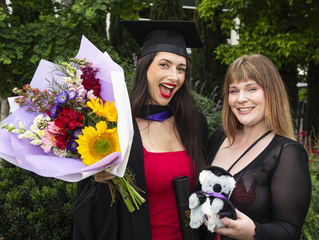 Bachelor of Laws graduate Jazmine Cowling celebrates with sister Jemma Strange at a UniSQ graduation ceremony at The Empire, Wednesday, October 30, 2024. Picture: Kevin Farmer