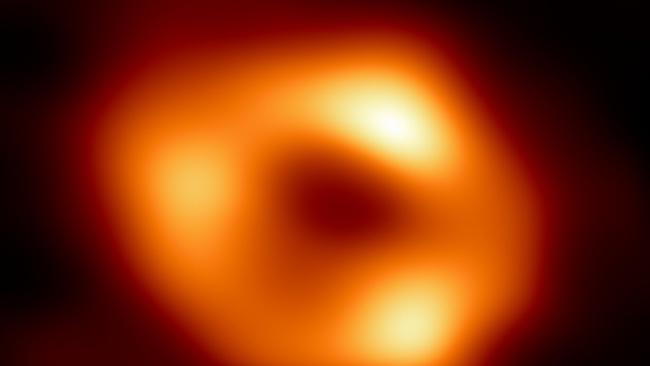 The Event Horizon Telescope image shows a black central region, known as the shadow, surrounded by a bright ring-like structure. Picture: AFP PHOTO / European Southern Observatory