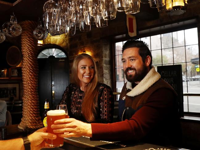 Paris Granger and Ben McCallum enjoy a drink at the Lord Nelson in the Rocks, Sydney. Picture: Nikki Short