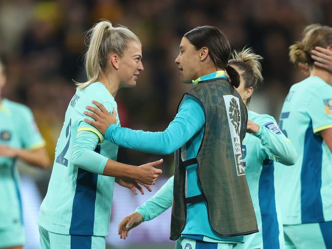 MELBOURNE, AUSTRALIA - JULY 31: Charlotte Grant and Sam Kerr of Australia celebrate the team's 4-0 victory and qualification for the knockout stage following the FIFA Women's World Cup Australia & New Zealand 2023 Group B match between Canada and Australia at Melbourne Rectangular Stadium on July 31, 2023 in Melbourne, Australia. (Photo by Robert Cianflone/Getty Images)