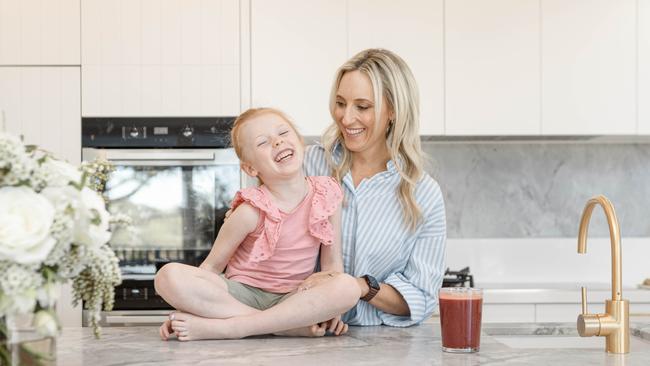 Nutritionist Amelia Phillips, 46, with daughter Ella.