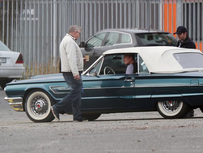 Sam Newman in an old car. Picture: Alex Coppel