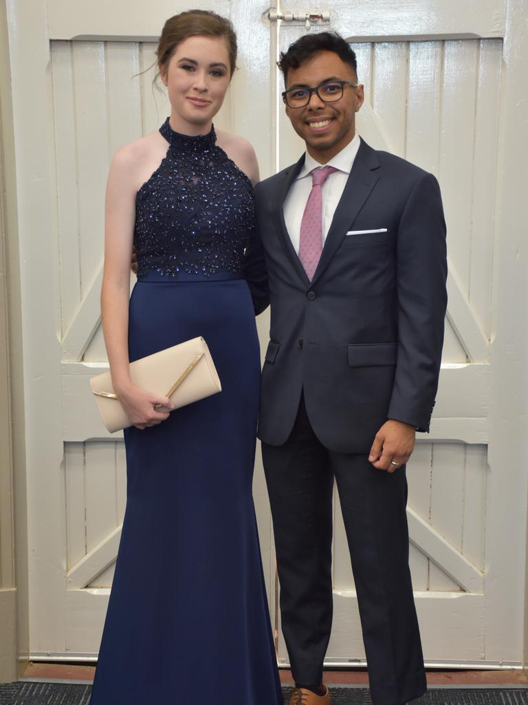 Sarah Hockings and Shayan Khademi celebrate graduation at the Assumption College formal.