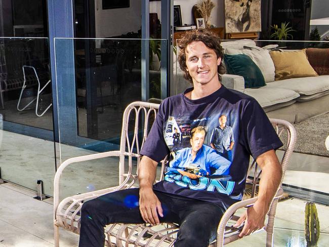 Swimmer Cameron McEvoy is listing his Isle of Capri home for sale and will accept Bitcoin as payment. Cam pictured with his dog Apollo.Picture: NIGEL HALLETT