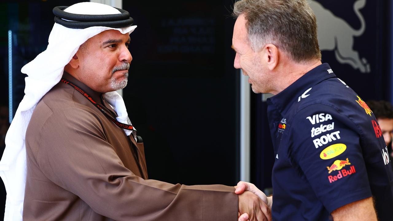 Prince Salman bin Hamad Al Khalifa talks with Oracle Red Bull Racing Team Principal Christian Horner in the Paddock. (Photo by Mark Thompson/Getty Images)