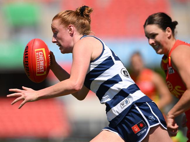 GOLD COAST, AUSTRALIA - SEPTEMBER 21: Aishling Moloney of the Cats runs with the ball during the round four AFLW match between Gold Coast Suns and Geelong Cats at People First Stadium, on September 21, 2024, in Gold Coast, Australia. (Photo by Matt Roberts/Getty Images)