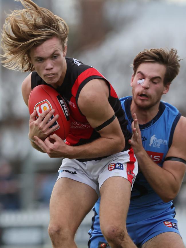 West Adelaide’s Kobe Ryan marks strongly opposed to Sturt’s Casey Voss at Unley Oval on Sunday. Picture: SANFL Image/David Mariuz