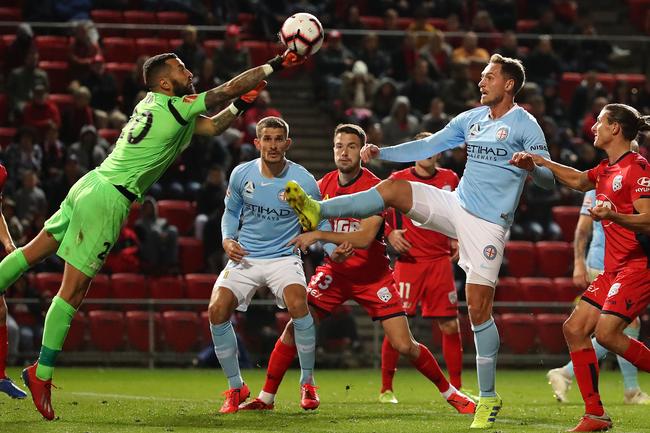 Adelaide United’s goalkeeper Paul Izzo makes a save during the A-League elimination final between Adelaide United and Melbourne City at Coopers Stadium. Picture: Scott Barbour/Getty